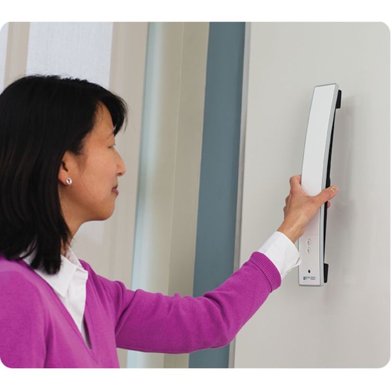 MimioTeach Placing On Whiteboard Lifestyle - Woman Active Holding