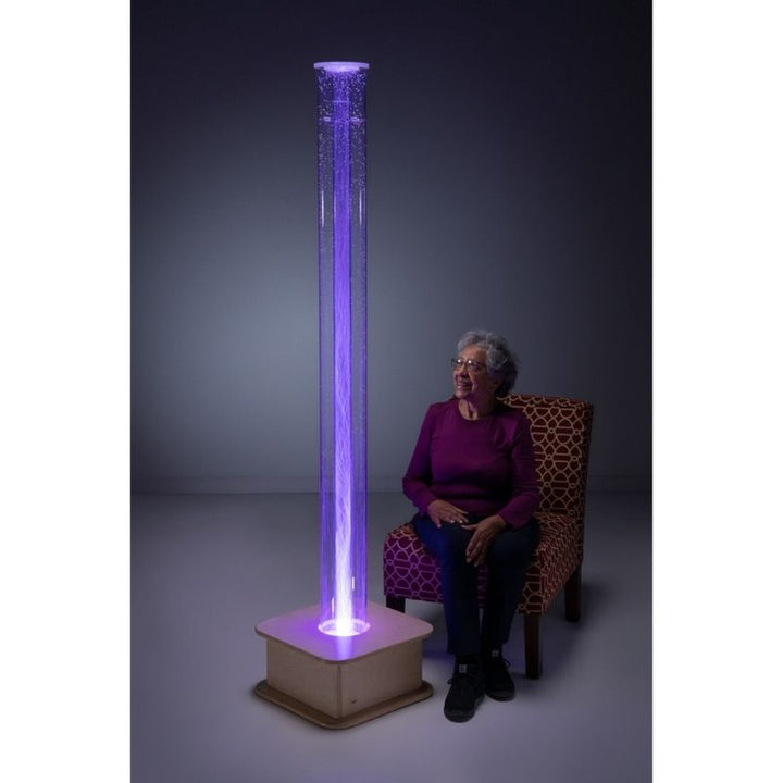 SouthpawMSE_InteractivePopcornTube_72H_1-elderly women happy siting in front of bubble tube