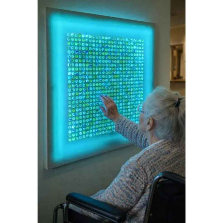 AHS_Marvelous_Sensory_Marble_Wall_Panel_2 - Person touching blue marble wall