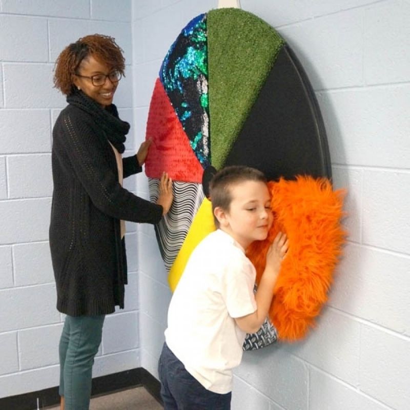 Experia Sensory Texture Wheel - Adult Woman And  A Kid Touching The Wheel