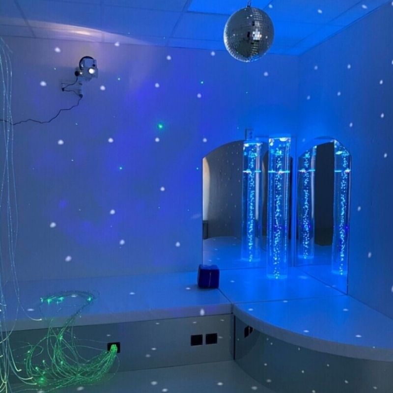 TFH Bubble Tube Corner Seat Base - 1 Hole - Room corner view in blue light