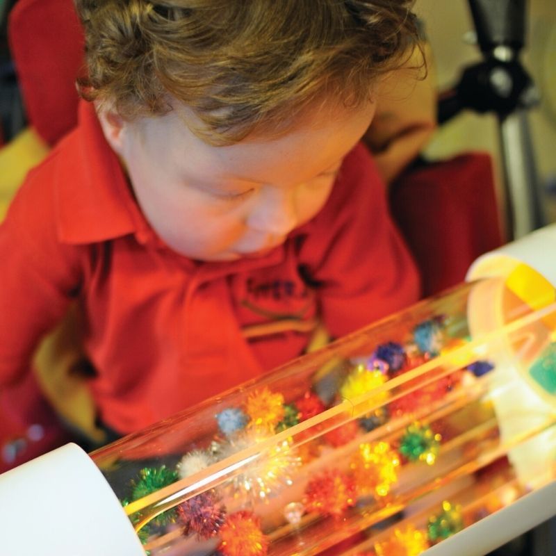 TFH Glitter & Lights Roll Adapted Reward - Active child play in red shirt