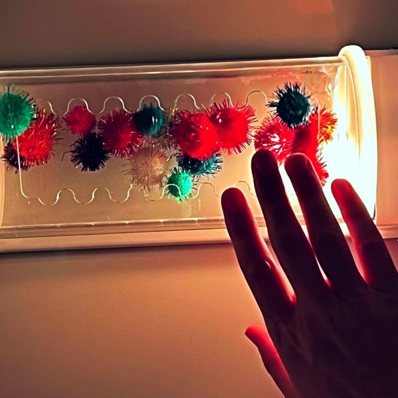 TFH Glitter & Lights Roll Adapted Reward - Warm light and a hand