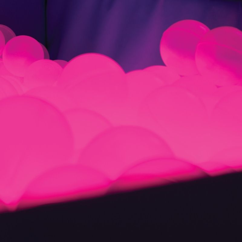 TFH Large Light-Up Ball Pit - w/ 3000 Balls - pit balls in pink light - close up view