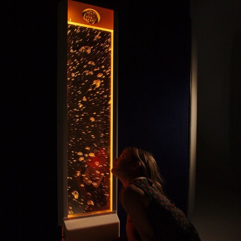 TFH Lights & Bubbles Water Panel - Child active playdark room setting orange light