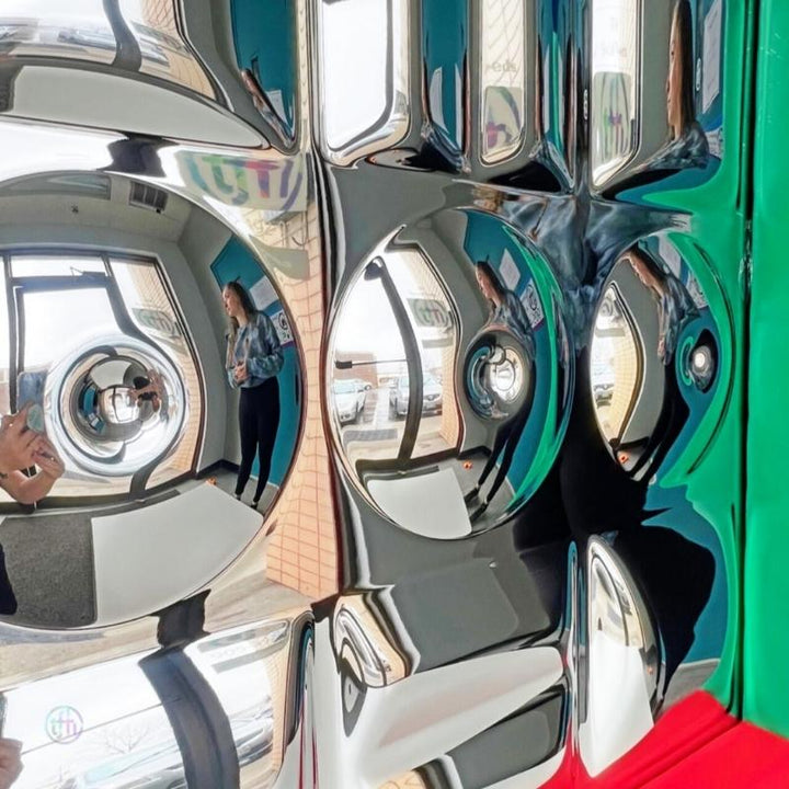 TFH Sensory Mirror With Padded Frame - Close up view with adult reflection