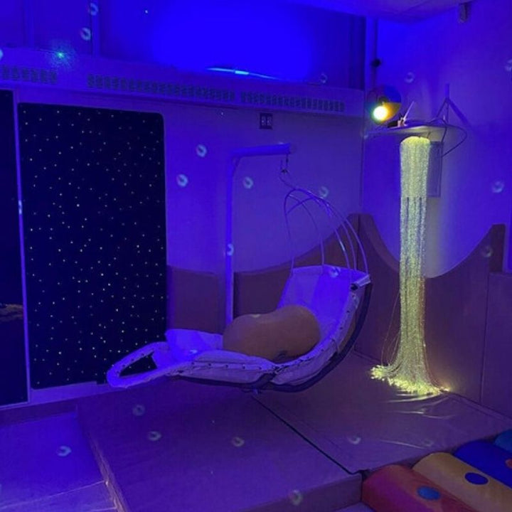 TFH Swaying Banana Leaf Chair - Landscape view blue light room