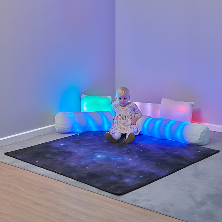 TTS Rechargeable Fibre Optic Sparkle Rug Baby Sitting Bluish Background