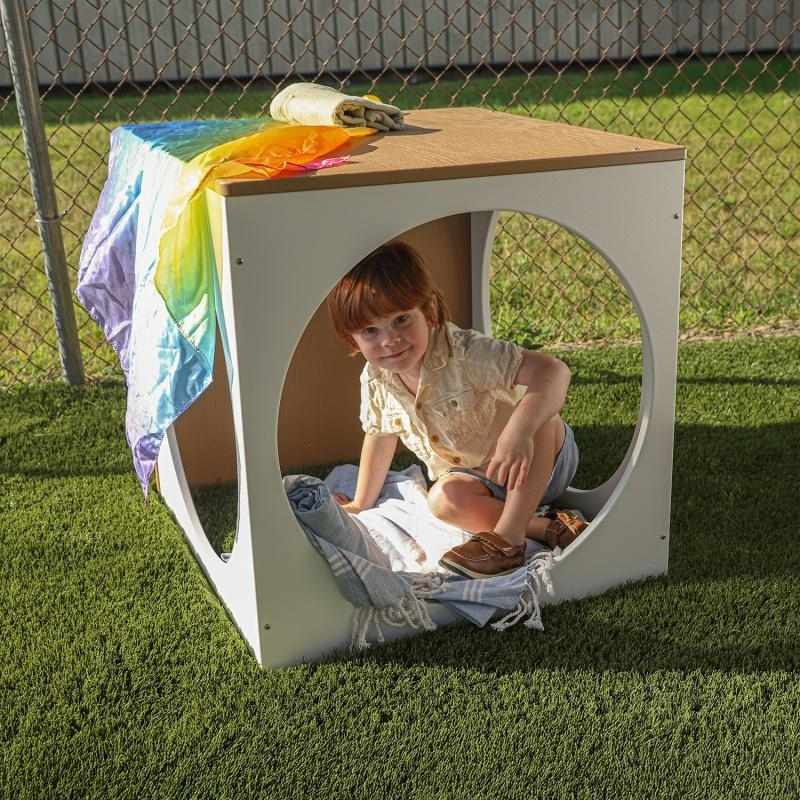 Whitney Brothers outdoored Play House Cube - Child Actively Inside The Cube On Outdoor Setting