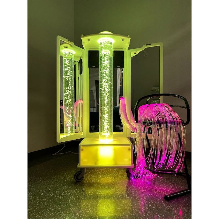 AHS Relaxation Mirrored Bubble Rover with yellow-green sensory lighting and pink fibre optics, medical grade sensory room equipment
