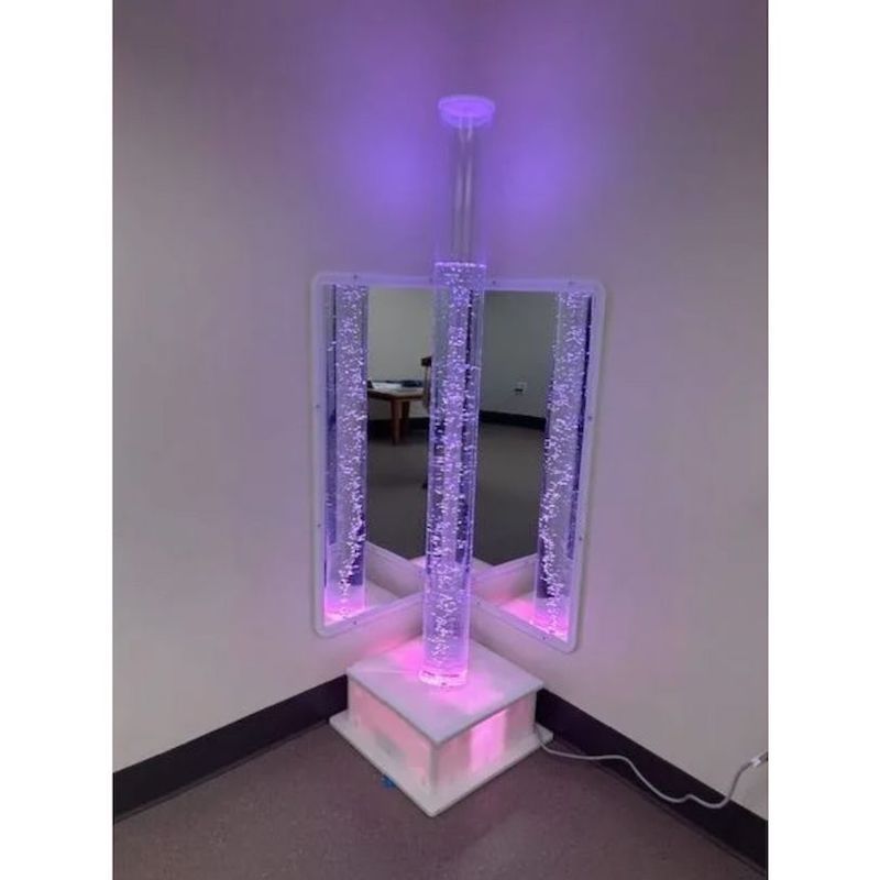 AHS Sensory Bubble Tube in purple LED lighting, a medical-grade sensory light for therapy rooms and sensory room building across North America