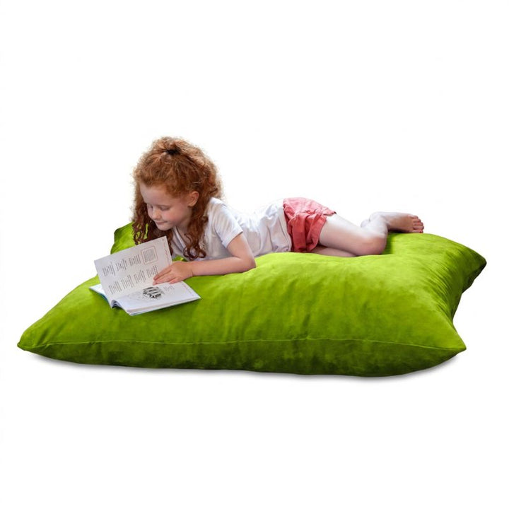 Child enjoying storytime on a Jaxx Pillow Saxx 4 bean bag floor pillow in Lime microsuede, a cheerful kids floor cushion