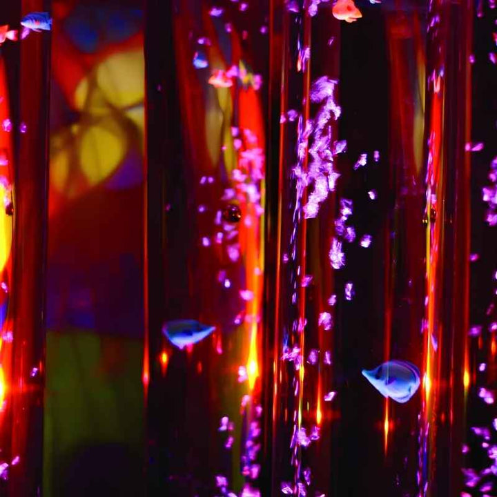 TFH Bubble Tube Fish silhouettes floating among bubbles in a colourful multi-sensory room bubble tube display