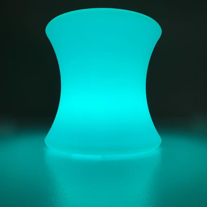 TFH Colour Morphing Stool glowing teal, a colour-changing sensory seat for classrooms and therapy rooms