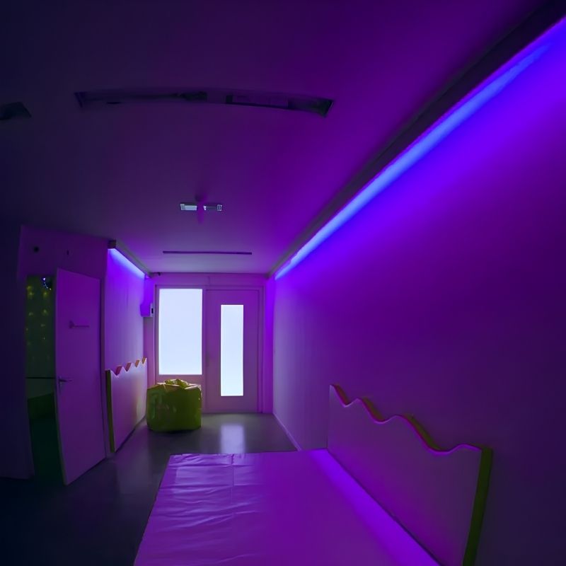 TFH Genie Colour Wash Kit strip lighting a sensory room hallway in deep blue and purple interactive colour wash
