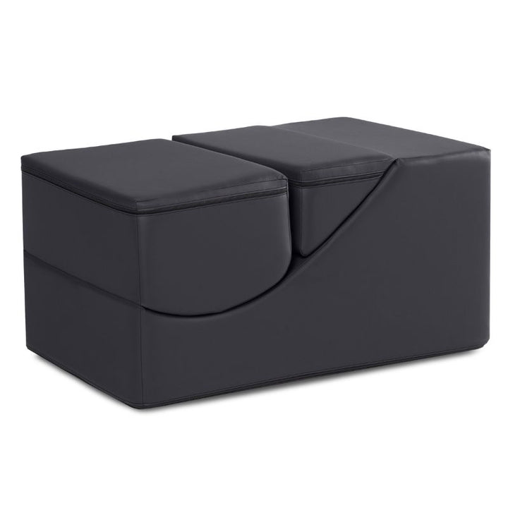 Jaxx Flexx convertible foam chair in black vinyl folded into its table and bench configuration for calm corners