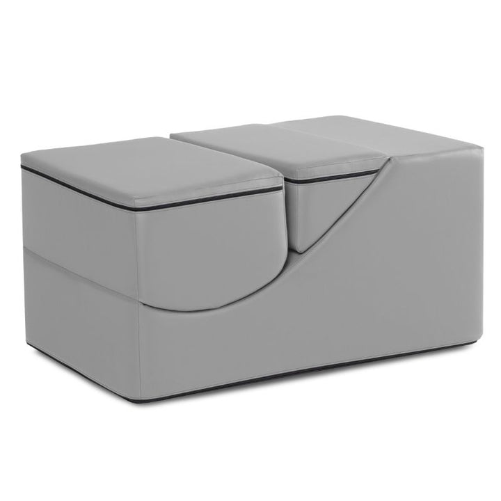 Jaxx Flexx convertible foam chair in grey vinyl folded into a table and bench, a sensory foam chair for classrooms