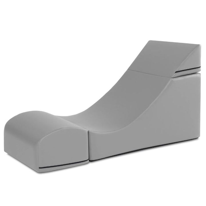 Jaxx Flexx convertible foam chair in grey vinyl shown in its expanded lounge configuration, flexible seating for kids and classrooms