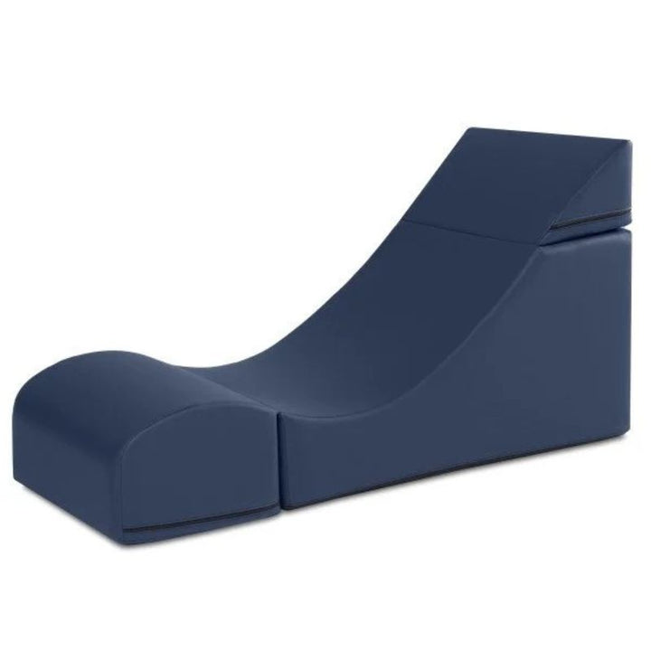 Jaxx Flexx convertible foam chair in navy blue vinyl shown expanded as a lounge seat for calm corners and classrooms