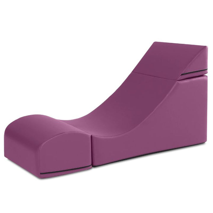 Jaxx Flexx convertible foam chair in purple vinyl shown in its expanded lounge configuration, comfortable flexible seating for kids