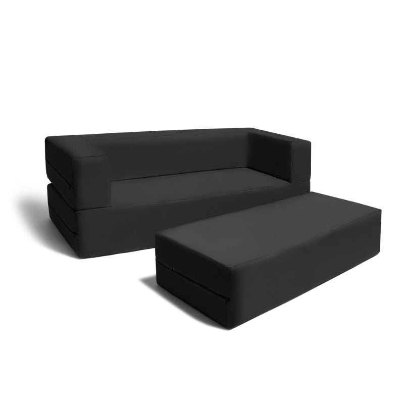 Jaxx Zipline convertible kids sofa and ottoman set in black, shown in its loveseat and ottoman configuration for homes and classrooms