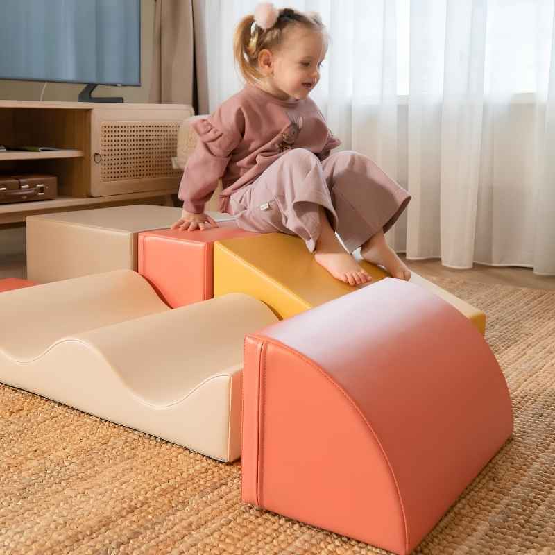 Toddler climbing barefoot on the IGLU Discoverer Soft Play Set in Pastel Fries at home