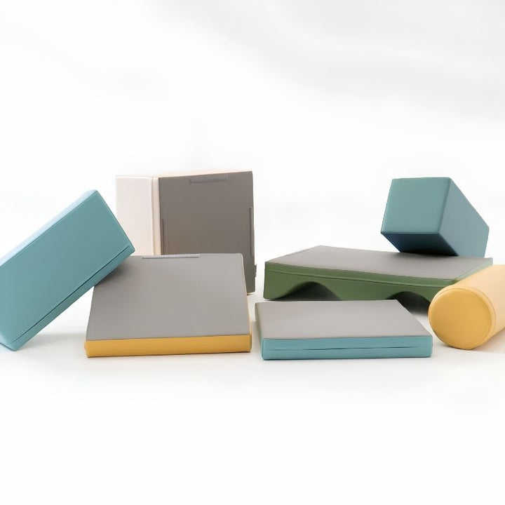 Individual foam shapes from the IGLU Discoverer Soft Play Set in Light Pastel, a modular toddler activity set
