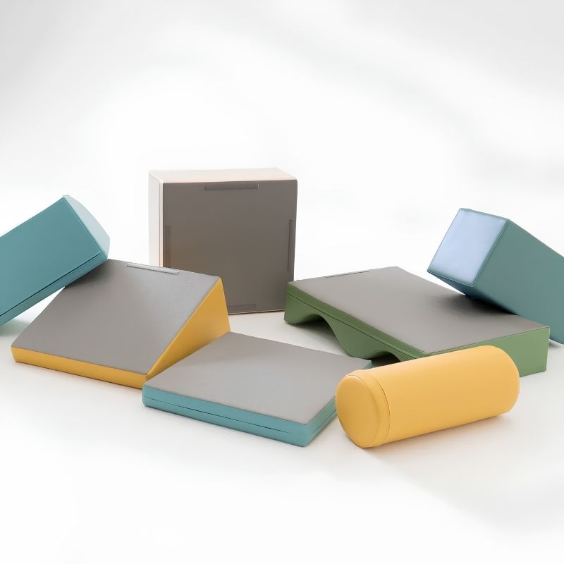 Foam shapes from the IGLU Discoverer Soft Play Set in Light Pastel spread out to show individual pieces