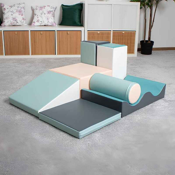 The IGLU Discoverer Soft Play Set in Pastel Turquoise set up in a home playroom for toddler active play