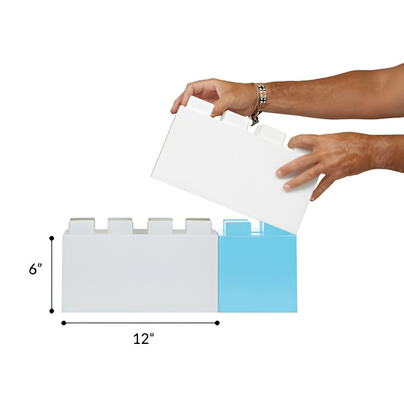 Hands connecting two EverBlock building blocks to show the tool-free assembly and true block dimensions of 6 inches by 12 inches