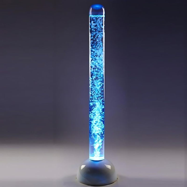 Experia Calming LED Bubble Tube glowing in blue light, showing the auto colour-cycling sensory bubble tube in a calming sensory room environment