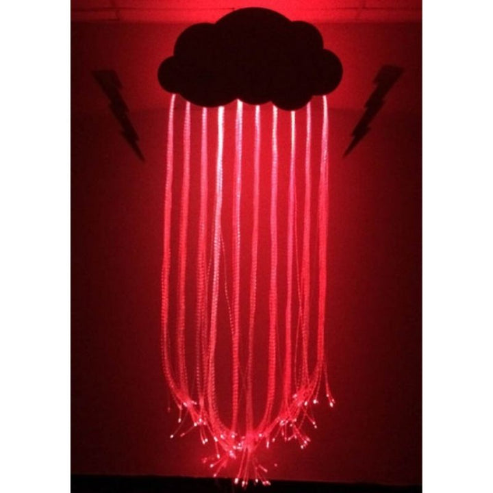 Experia Fibre Optic Raincloud front view in red light demonstrating the colour-changing Calming or Superactive fibre optic rainfall effect from the wall-mounted cloud installation