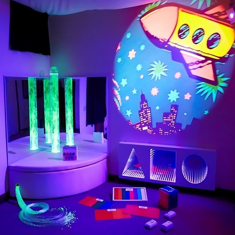 Experia IRiS Sensory Room complete setup showing the full wireless interactive multi-sensory room package with bubble tube, fibre optics, LED strips, and projector