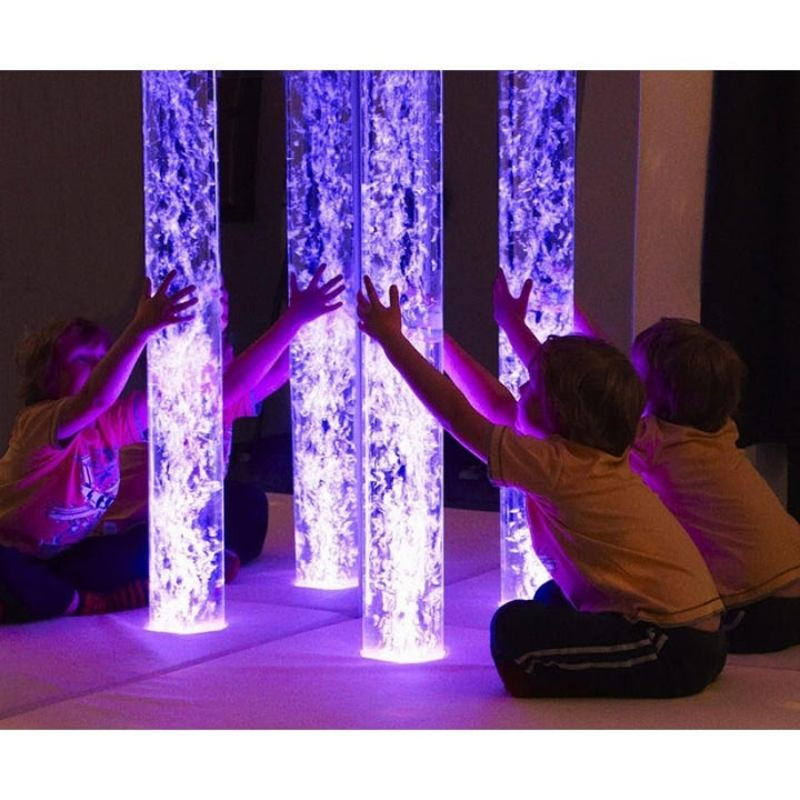 Child actively engaging with the Experia Superactive Sensory Room, demonstrating hands-on interactive play within the wireless multi-sensory room environment