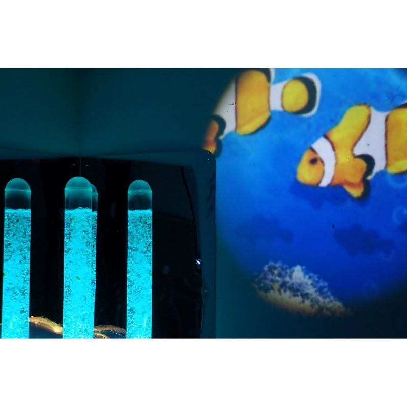 Experia Underwater Adventure Room Aurora LED Projector casting a clown fish projection across the room, showing the Tropical Fish effect wheel creating an immersive underwater scene