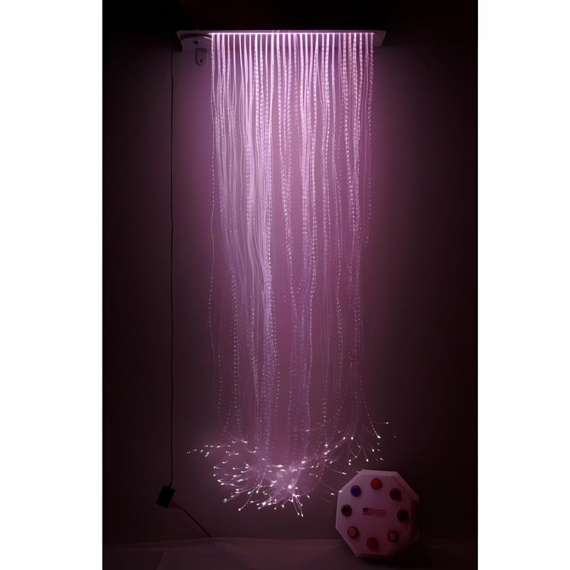 Experia Superactive LED Fibre Optic Cascade glowing in pink on a wall with wireless controller, showing the cascading colour-changing sensory light in the interactive room package