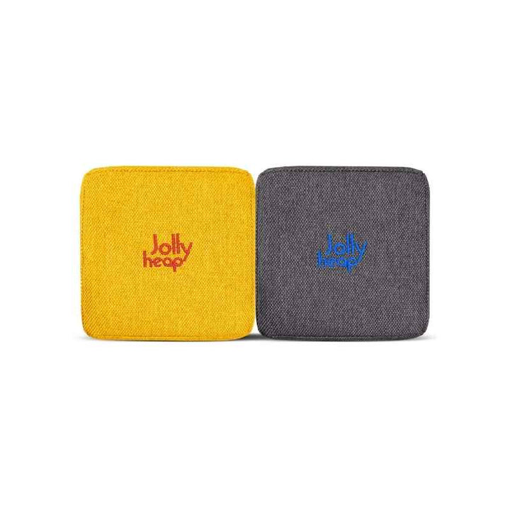 Woven fabric swatch for the JollyHeap Extra 16 magnetic block expansion set in yellow and violet, showing the embroidered logo detail and textured cover 
