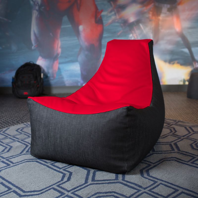 The Jaxx Pixel gaming bean bag chair in red sits in a game room, a comfortable seat for kids' spaces
