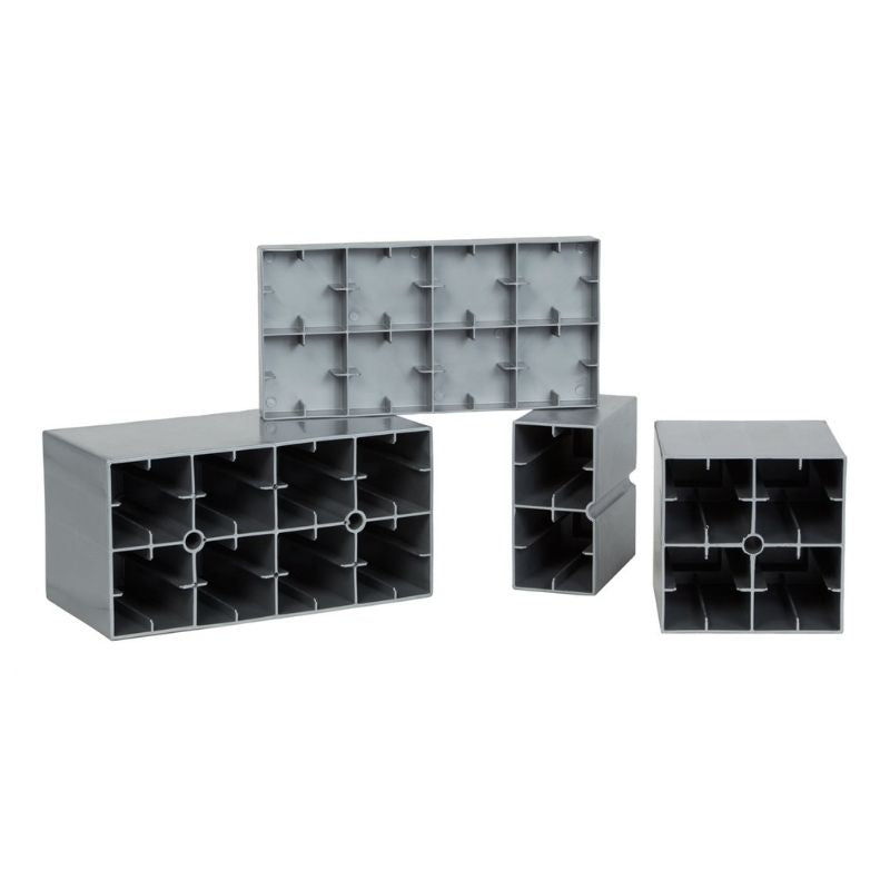 The different giant building block shapes included in the EverBlock Large Starter Kit: full blocks, quarter blocks, a line block and flat caps in white, yellow, blue and light blue