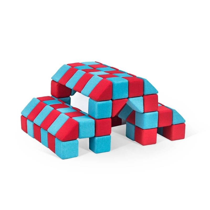Arched tunnel structure built from JollyHeap Joy giant magnetic building blocks in red and light blue, suited to schools and therapy rooms