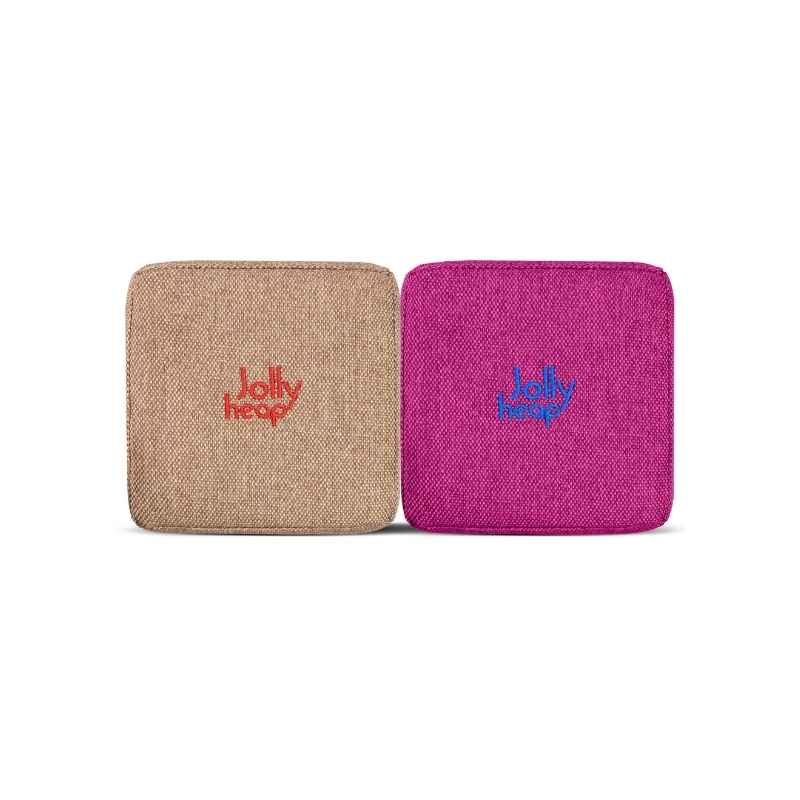 Fabric texture close-up of light brown  and violet JollyHeap Joy giant magnetic building blocks showing the soft woven exterior and embroidered logo