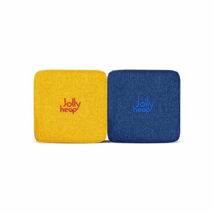 Fabric texture close-up of yellow and blue JollyHeap Joy giant magnetic building blocks showing the soft woven exterior and embroidered logo