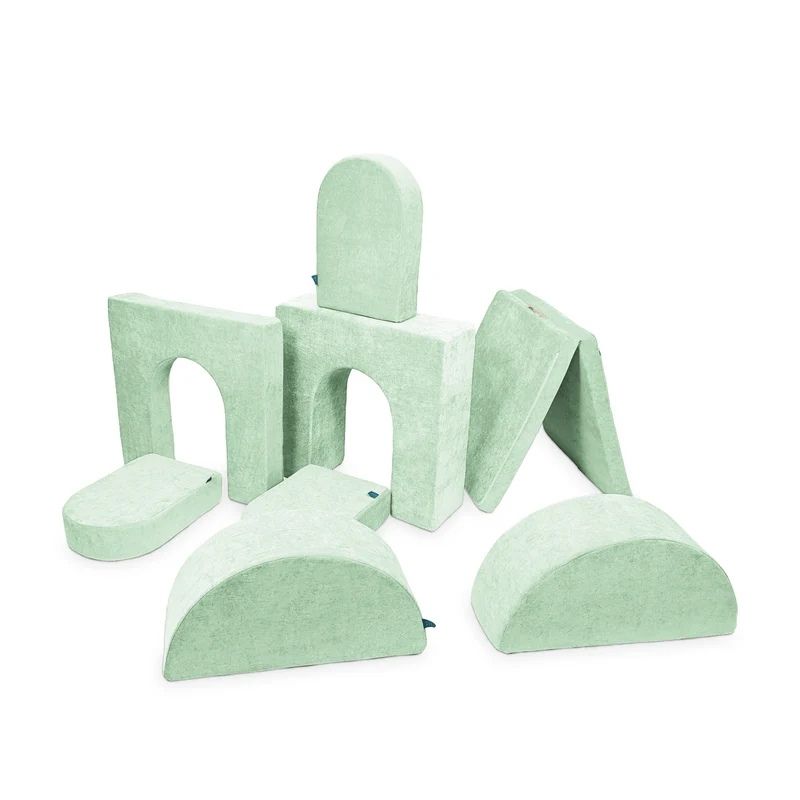 Go Coconut Architect Bundle in Cool Cucumber showing the full 8-piece modular foam play couch with exclusive half-moon rocker pieces for dome building, rocking arches, and tunnel configurations