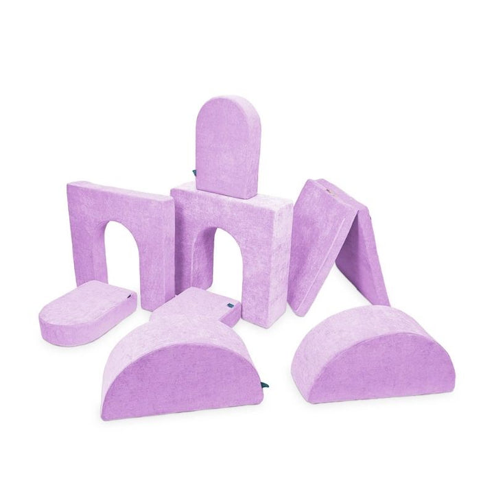 Go Coconut Architect Bundle in Lilac Lush showing the 8-piece foam play couch set with half-moons, walls, doors, and thin base pieces and machine-washable Durable Micro Velveteen covers, 100% made in Canada