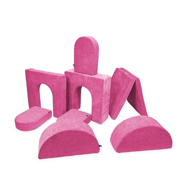 Go Coconut Architect Bundle in Pitaya Punch showing the modular foam play couch with half-moon rockers, walls, doors, and thin base pieces made in Canada with CertiPUR-US certified foam