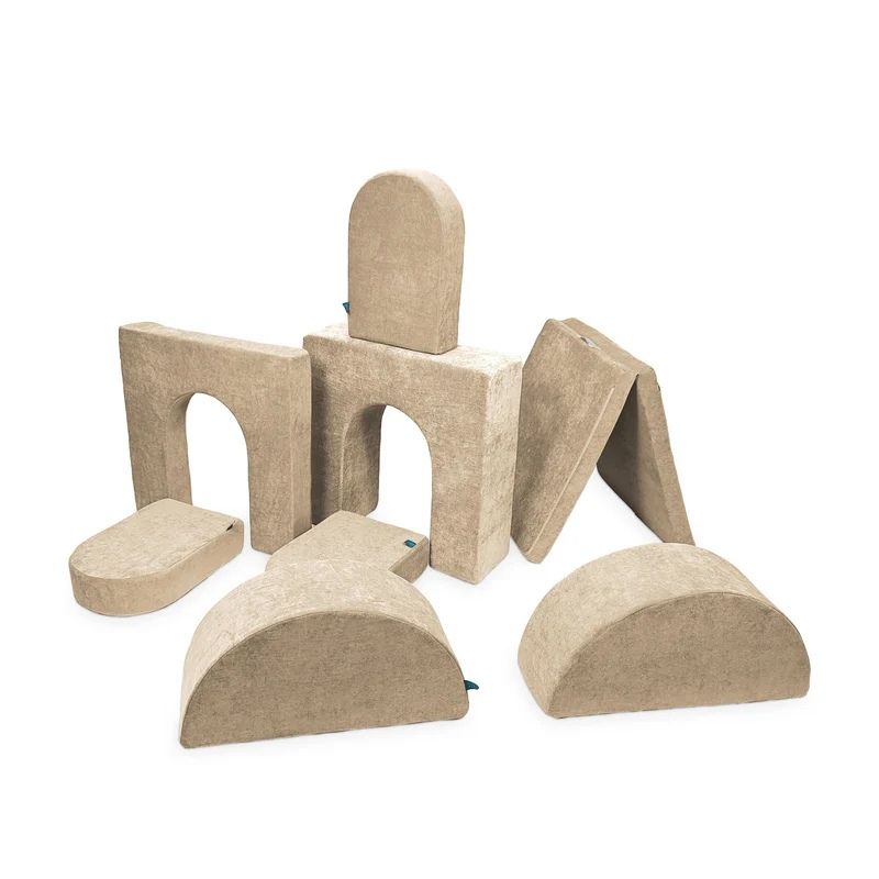 Go Coconut Architect Bundle in Sand Dune showing the modular CertiPUR foam play couch with five distinct piece shapes including half-moon rockers for Go Coconut's most versatile fort and dome building bundle