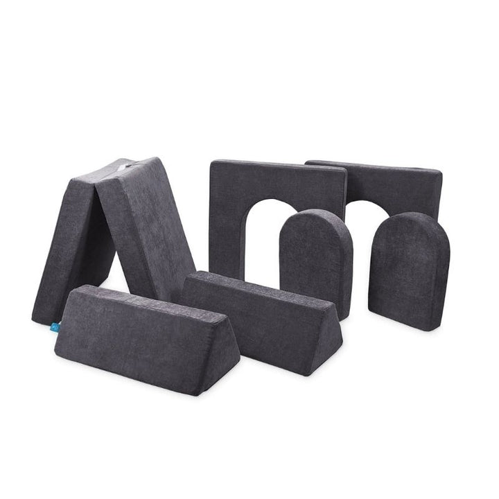 Go Coconut Builder Bundle in Charcoal Chill showing the 7-piece modular play couch with 5in walls and doors that create enclosed fort and castle configurations for imaginative play