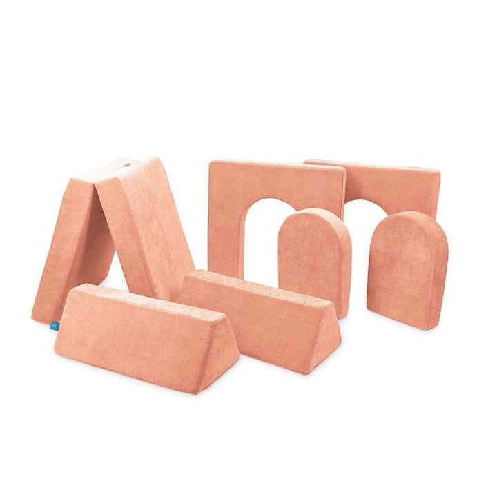 Go Coconut Builder Bundle in Peach Party showing the 7-piece CertiPUR foam play couch with walls and doors that enable enclosed fort and room configurations for imaginative and sensory play