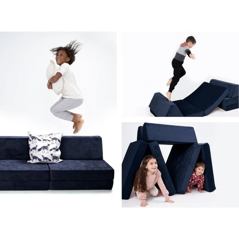 Children actively playing and building configurations with Go Coconut - The Coconut in Blackberry Shadow demonstrating the modular foam play couch's creative and sensory play value