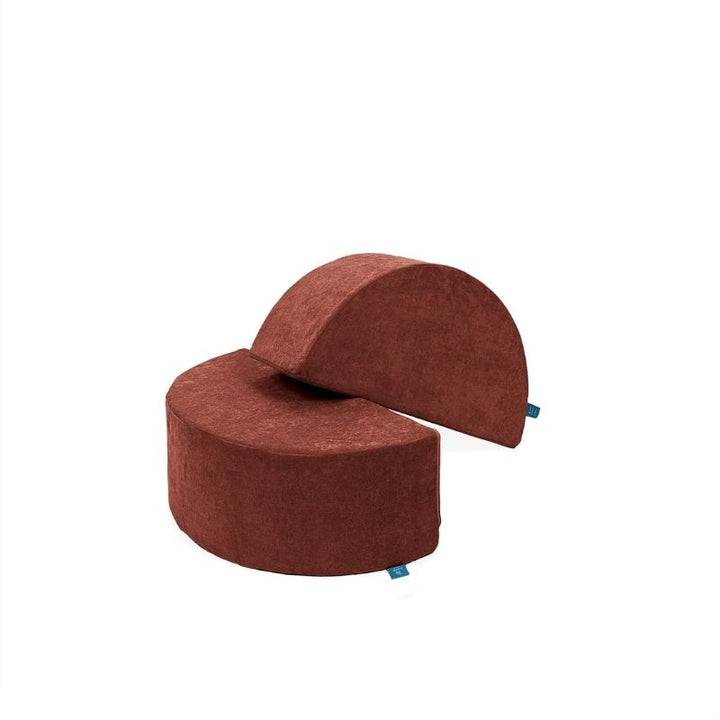 Go Coconut Half-Moon 2 Pack in Terracotta Twirl showing the paired curved arch foam modules used as rockers, mountain platforms, or playhouse roof shapes